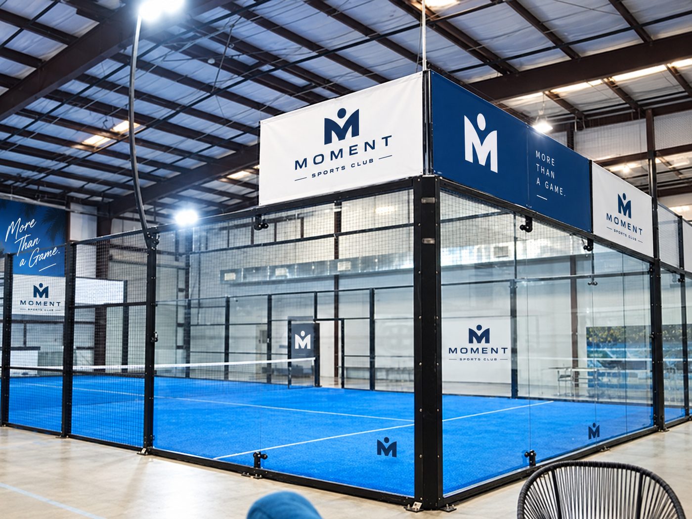 Indoor padel court with Moment branding